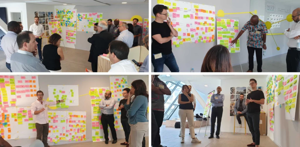 Participants brainstorm key challenges and solutions in a design-thinking workshop. 
