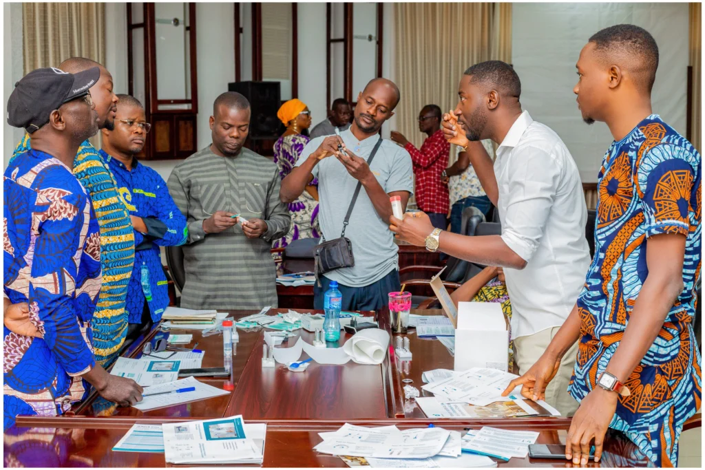 Christian Cheumani training attendees on iCheck